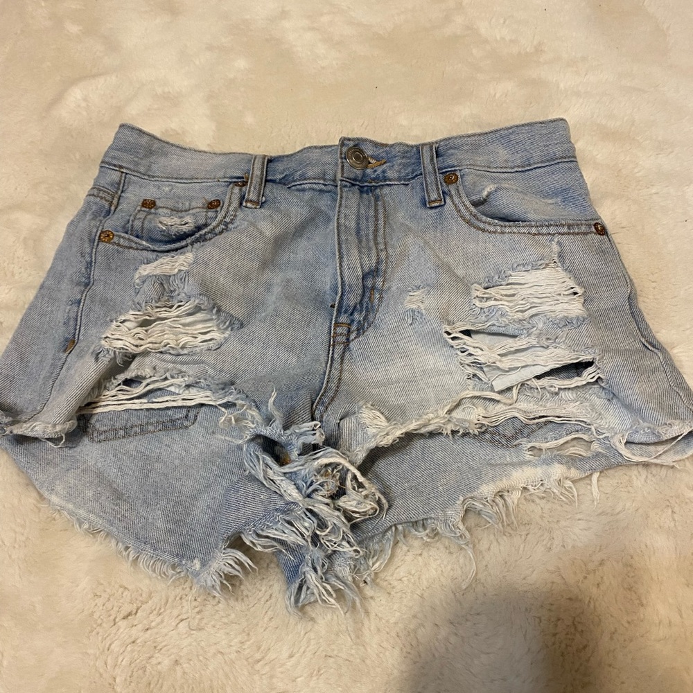 Light wash ripped denim shorts